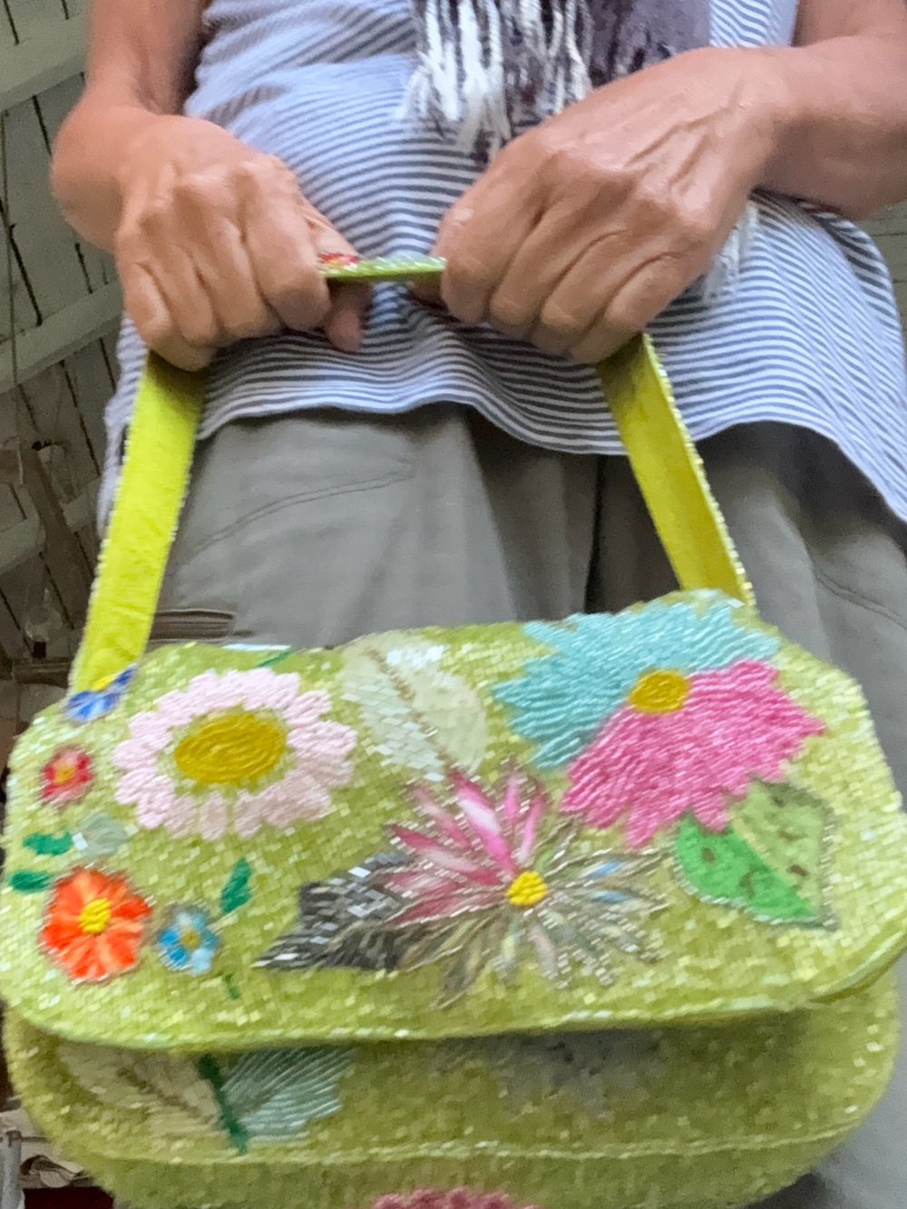 Accessorize beaded floral evening bag.
